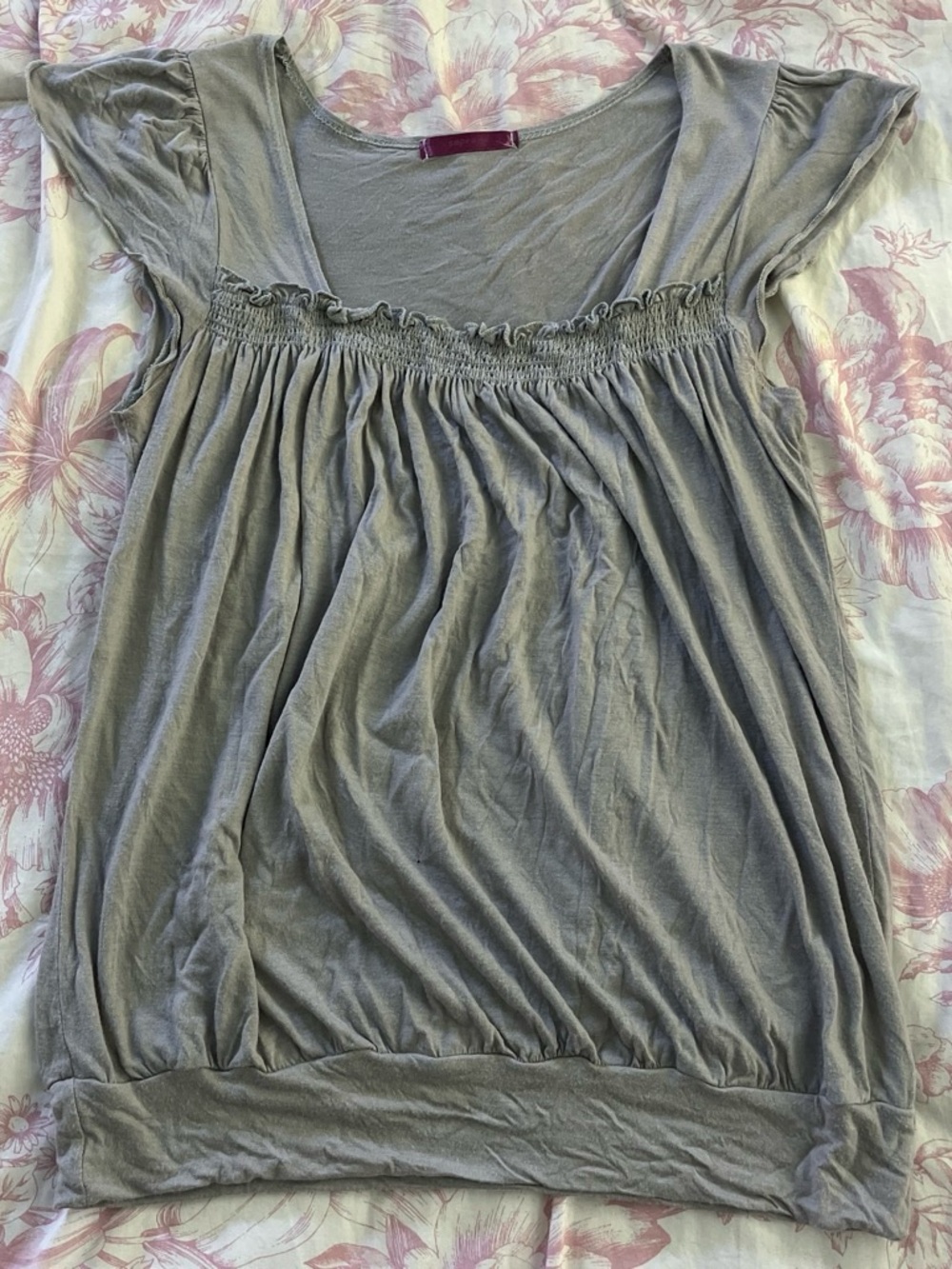 Grey babydoll top with ruffle detail
